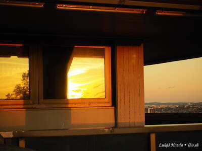Sunset Reflection in Glass at Strahov